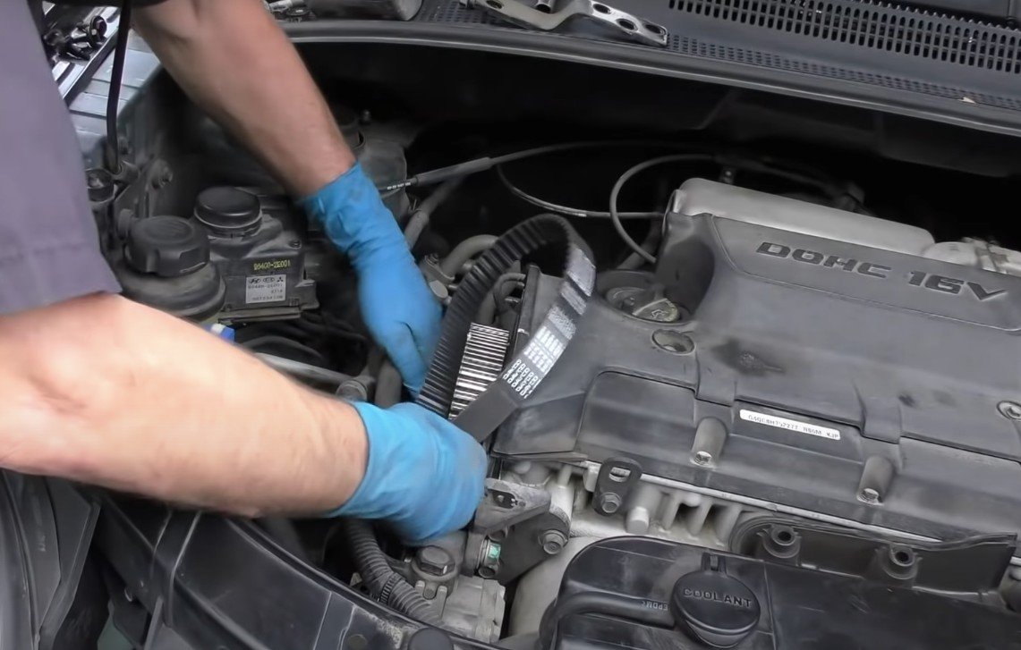 Mobile mechanic changing serpentine belt in Anaheim, CA.